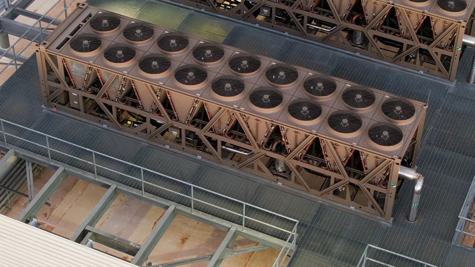A row of tall dark server racks of increasing height, only the first lit, with a red line tracing a timeline above them