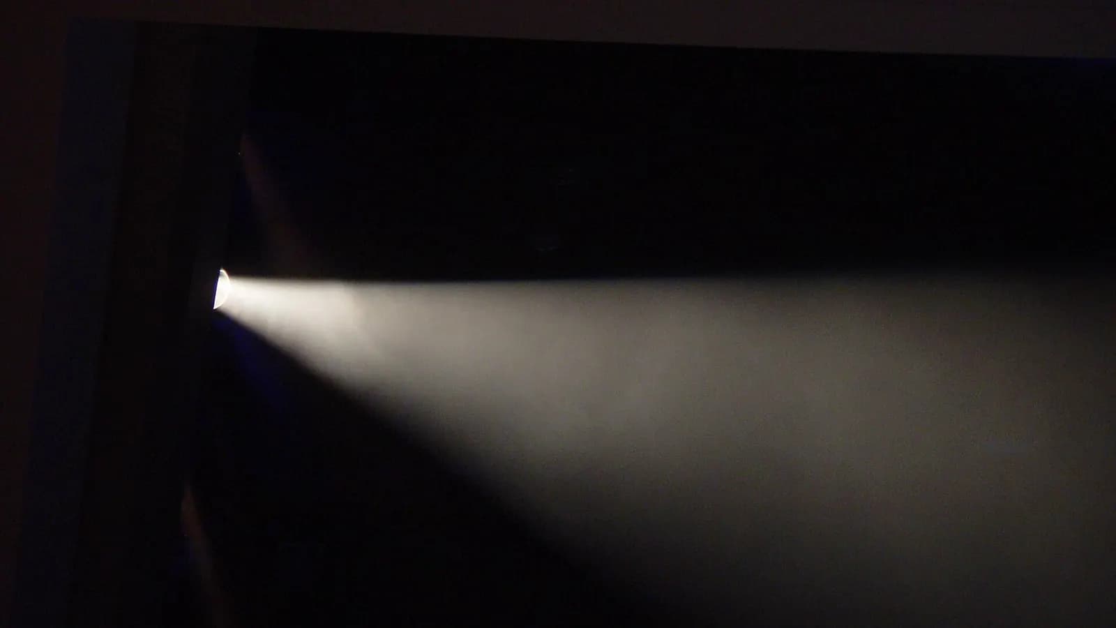 A strip of film frames dissolving into waveform lines